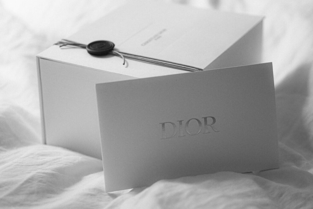 An elegant perfume gift box tied with ribbon, ready for a special occasion